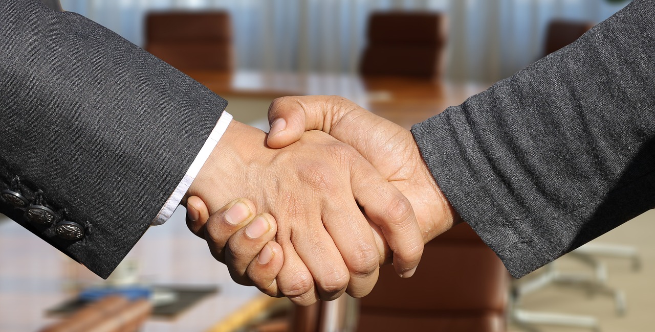 Handshake session between two parties involved in a negotiation