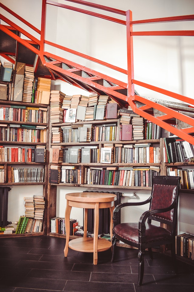 Book lots on wooden shelves