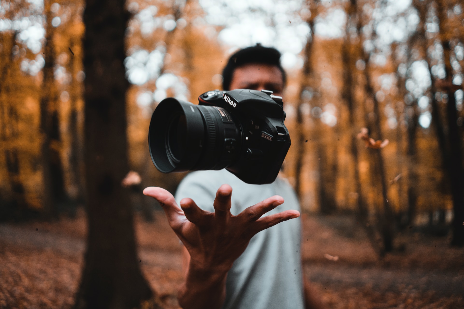 Man presenting a camera for real estate.