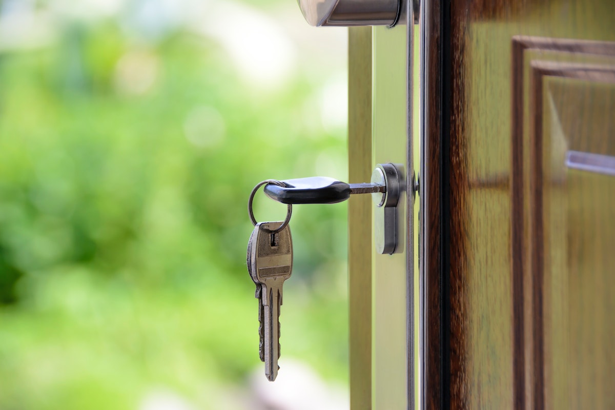 Unlocked door with keys.