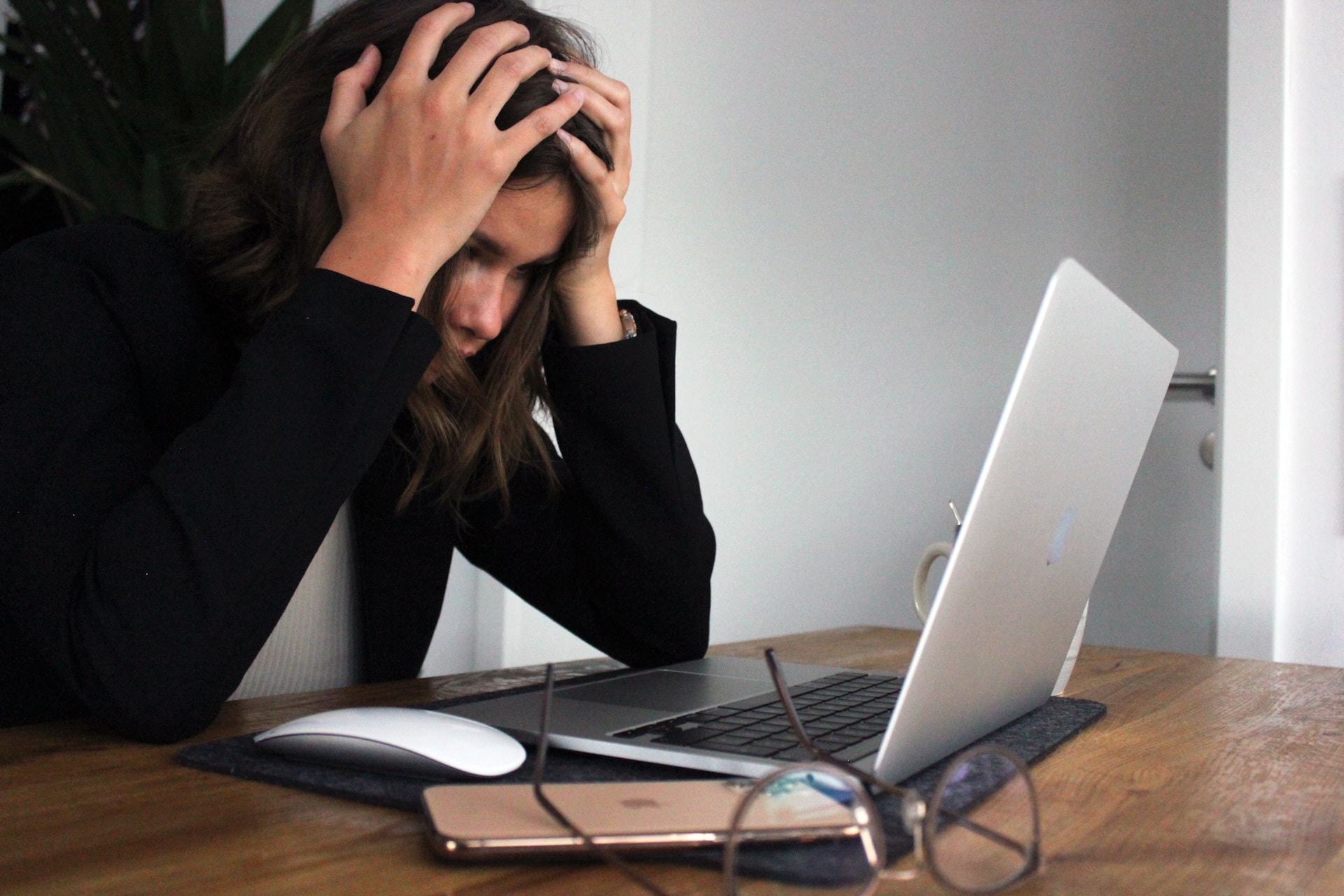 a business woman who is stressed and frustrated