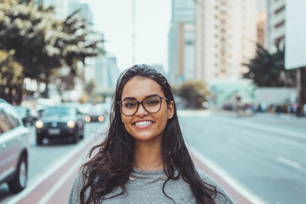 Smiling woman in the city.