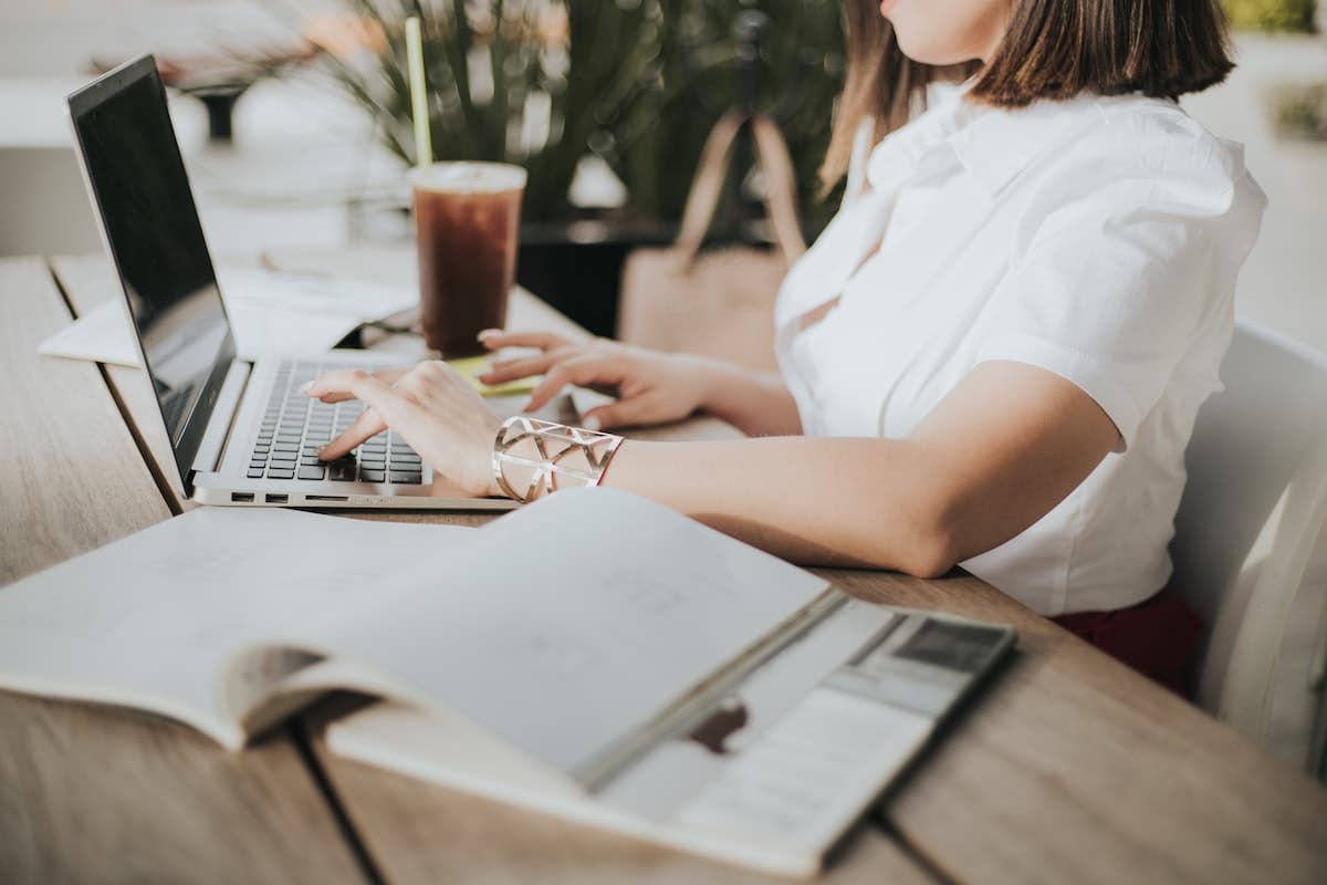 Woman working on her real estate marketing campaign.