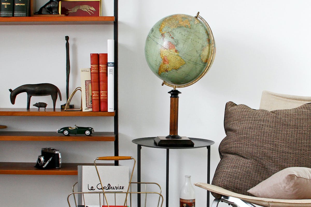 Desk Globe on End Table Beside Chair