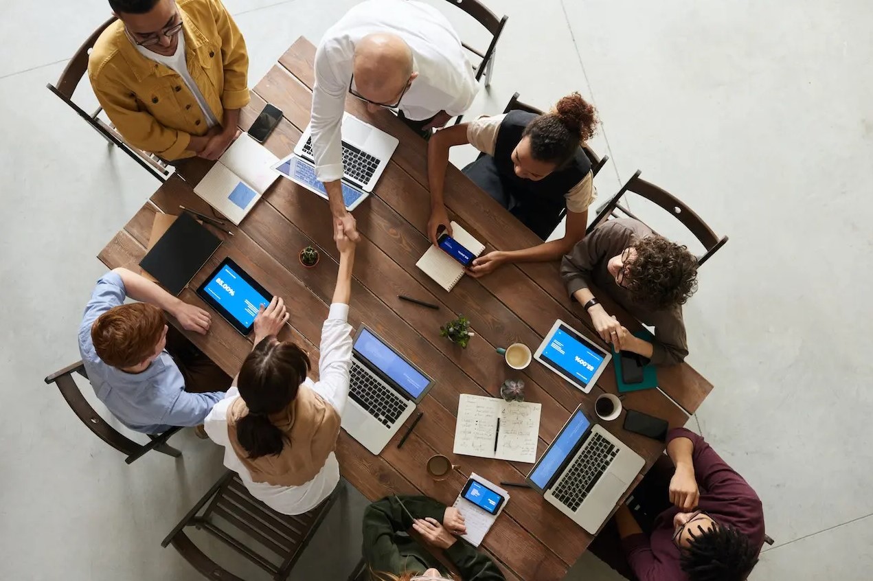 Real estate agent doing meeting when laptop and tablets