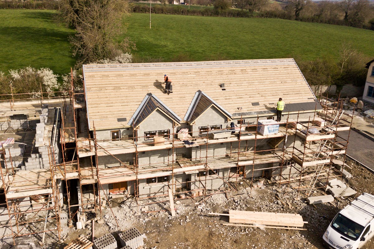 Aerial Photo Of Brown 3-story House