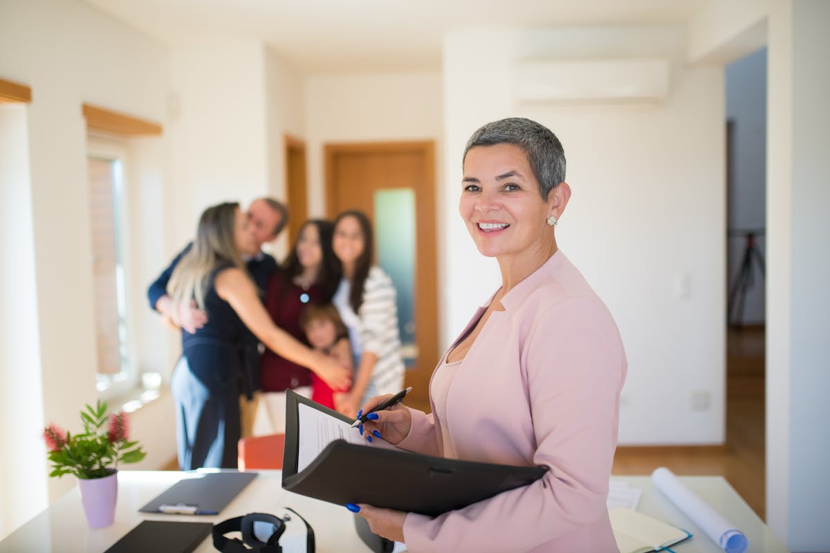 an agent helping a family make the right decision in buying a home